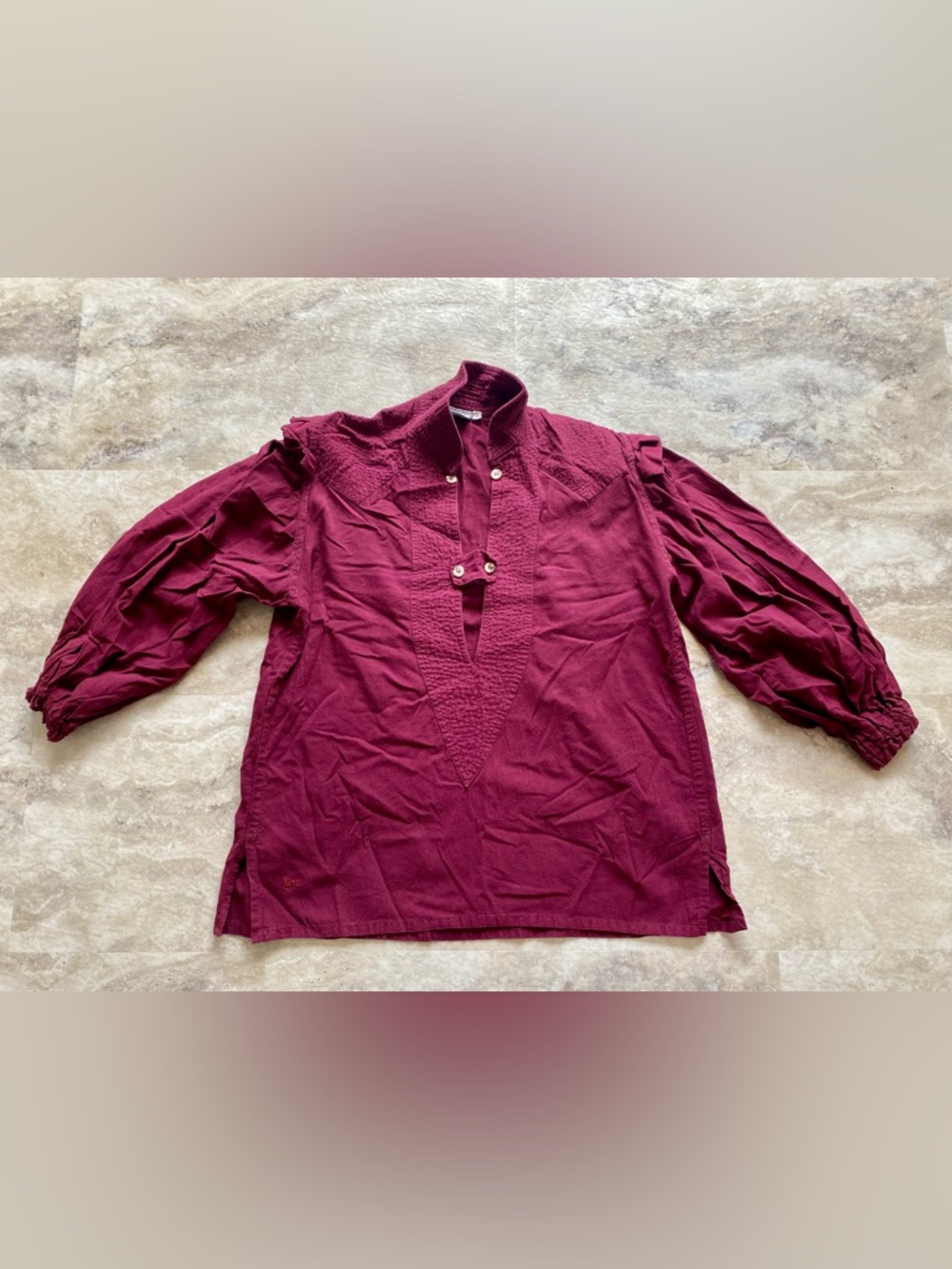 Burgundy poet shirt.  Men’s small. Will also fit woman.